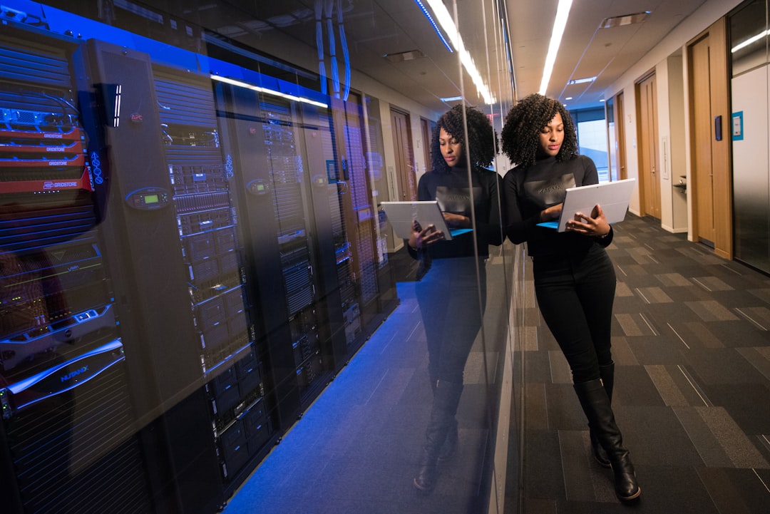 woman-in-black-top-using-surface-laptop-glrqywjguey